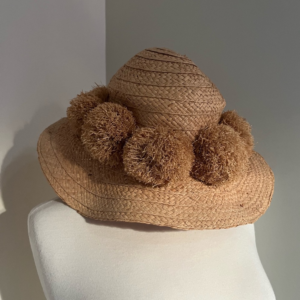 Natural woven sun hat with large raffia pompoms